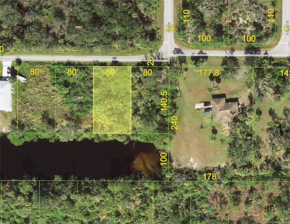 This is a satellite map showing property lot lines and dimensions for a residential area — 13057 BATLIN AVENUE, PORT CHARLOTTE, FL