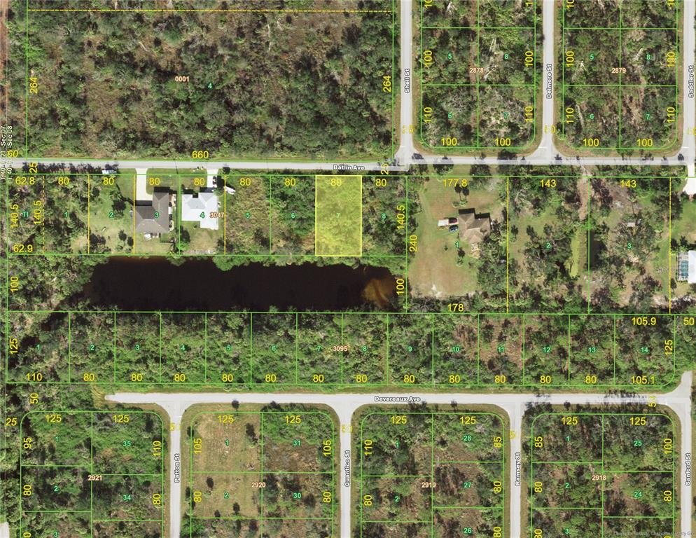 This is a satellite map showing residential land parcels, streets, and a central pond — 13057 BATLIN AVENUE, PORT CHARLOTTE, FL