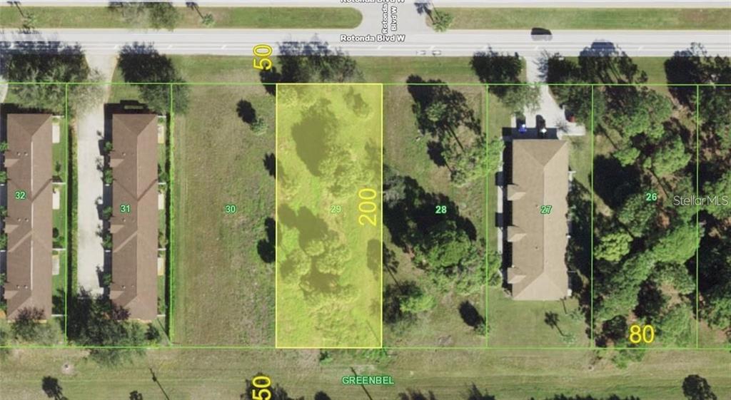 This aerial map shows a rectangular, highlighted vacant lot situated between two existing residential buildings — 203 ROTONDA BOULEVARD W UNIT 3, ROTONDA WEST, FL