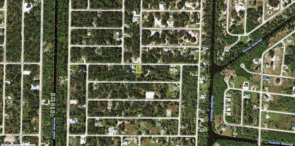This is an aerial map view of a residential neighborhood with a highlighted property lot — 19143 ROOSEVELT AVENUE, PORT CHARLOTTE, FL