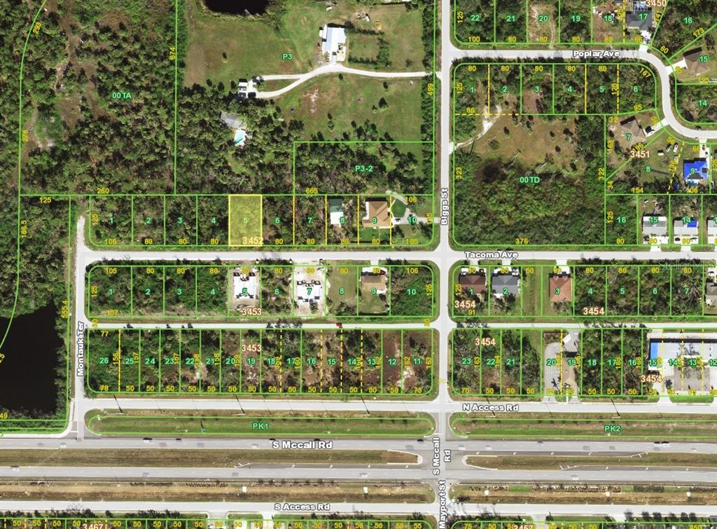 This is an aerial map showing residential lots, streets, and undeveloped land — 9218 TACOMA AVENUE, ENGLEWOOD, FL