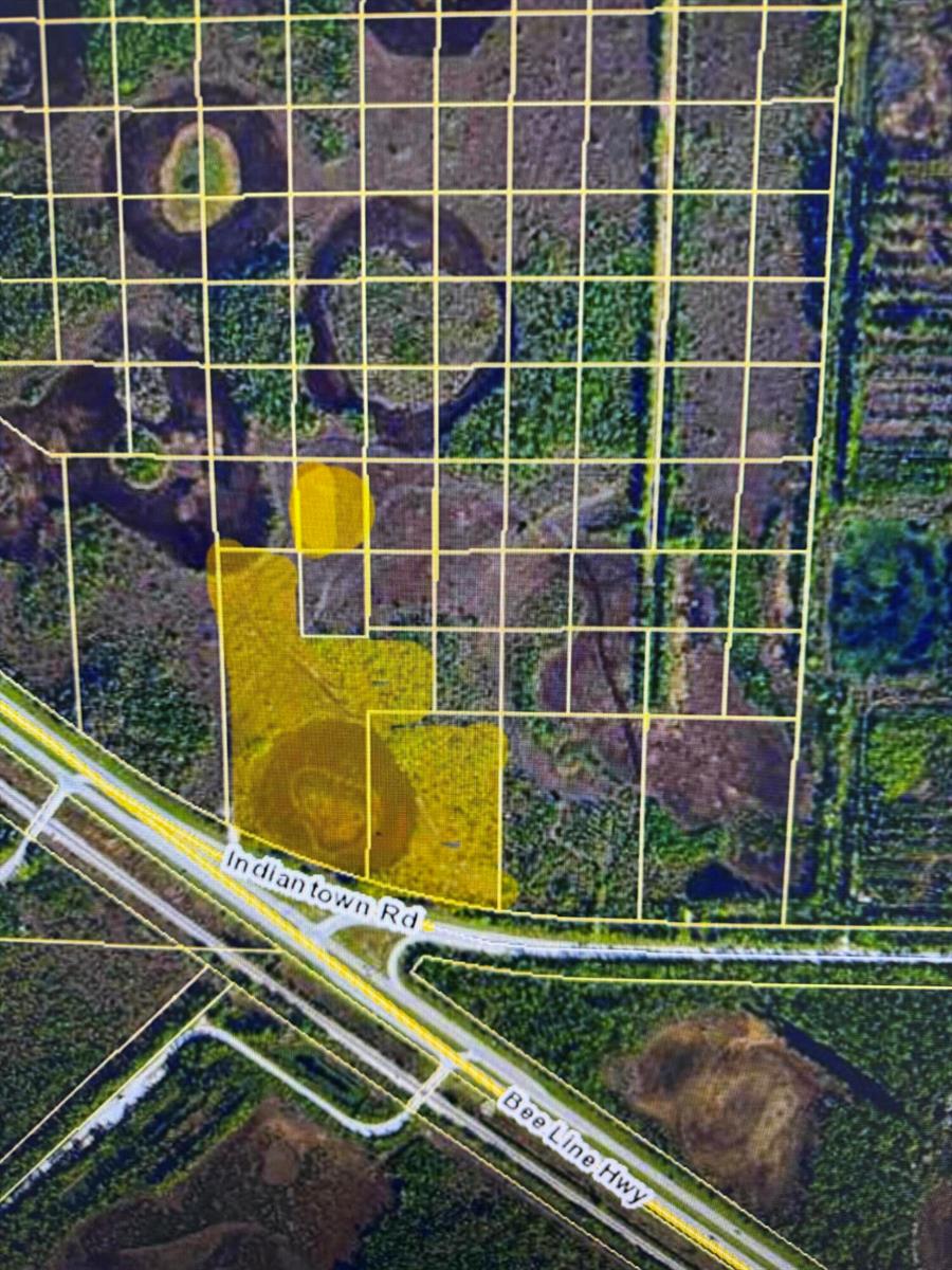 An aerial map shows a yellow highlighted property parcel located near the intersection of two highways — 19807 W Indiantown Road, Jupiter FL 33478, JUPITER, FL