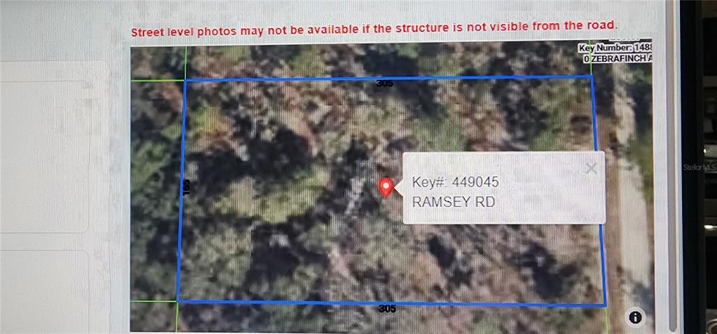 This is a satellite map showing a rectangular plot of land with dimensions 305 by 165 — 18043 RAMSEY ROAD, WEEKI WACHEE, FL