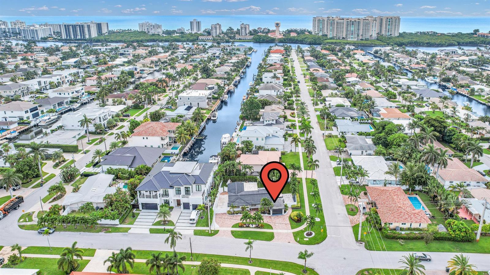 An aerial view shows a residential neighborhood with a canal and a marked house — 701 Appleby Street, Boca Raton FL 33487, BOCA RATON, FL