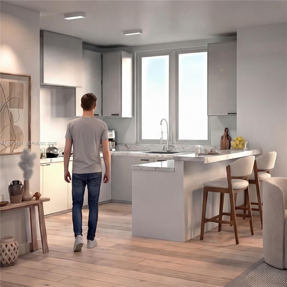 This is a rendering of a modern kitchen featuring light cabinetry, marble countertops, and bar seating — FORT LAUDERDALE, FL