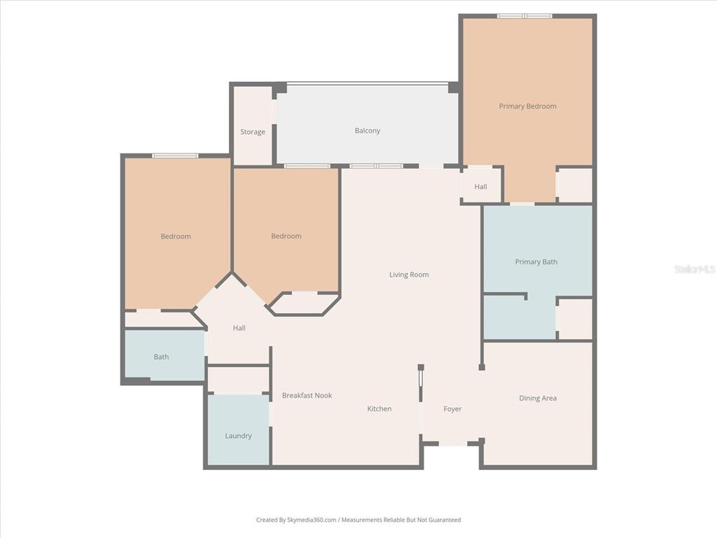 This is a floor plan of a three-bedroom apartment with a balcony and laundry room — 5036 SHOREWAY LOOP UNIT 30105, ORLANDO, FL