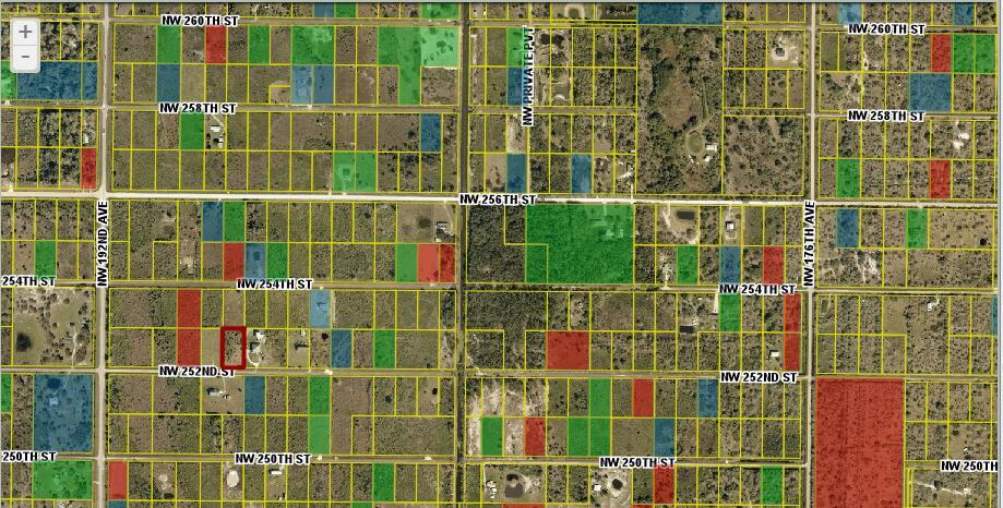 This is a map showing land parcels with various color-coded highlights and street labels — 18935 NW 252nd Street, Okeechobee FL 34972, OKEECHOBEE, FL