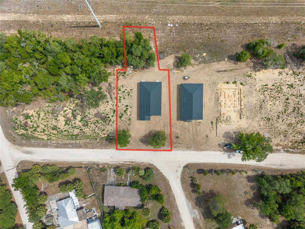 An aerial view shows a residential lot with two houses and a red boundary outline — 13291 NE 54TH STREET, WILLISTON, FL