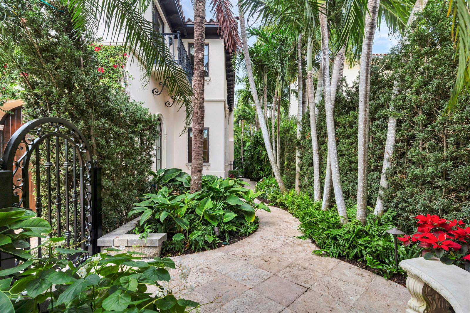 A stone walkway leads past a stucco house, palm trees, and lush landscaping — 261 Seminole Avenue, Palm Beach FL 33480, PALM BEACH, FL