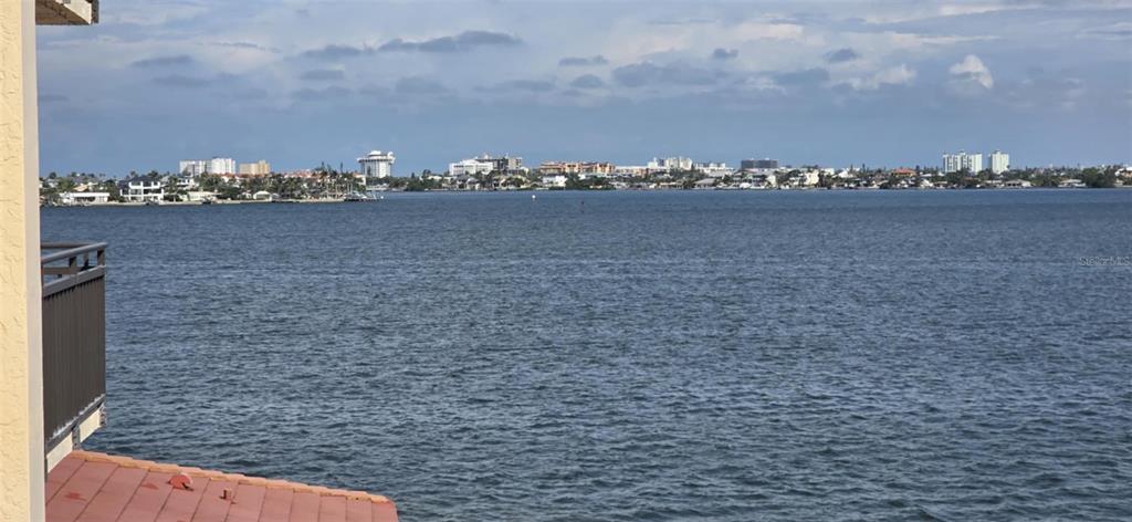 A view of a bay from a balcony with a railing and a tiled roof — 6177 SUN BOULEVARD UNIT 401, ST PETERSBURG, FL