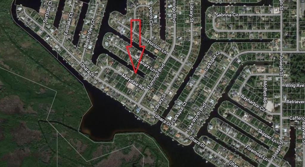This is an aerial map showing a residential neighborhood with a red arrow pointing toward a lot — 17162 MARYDALE ROAD, PORT CHARLOTTE, FL