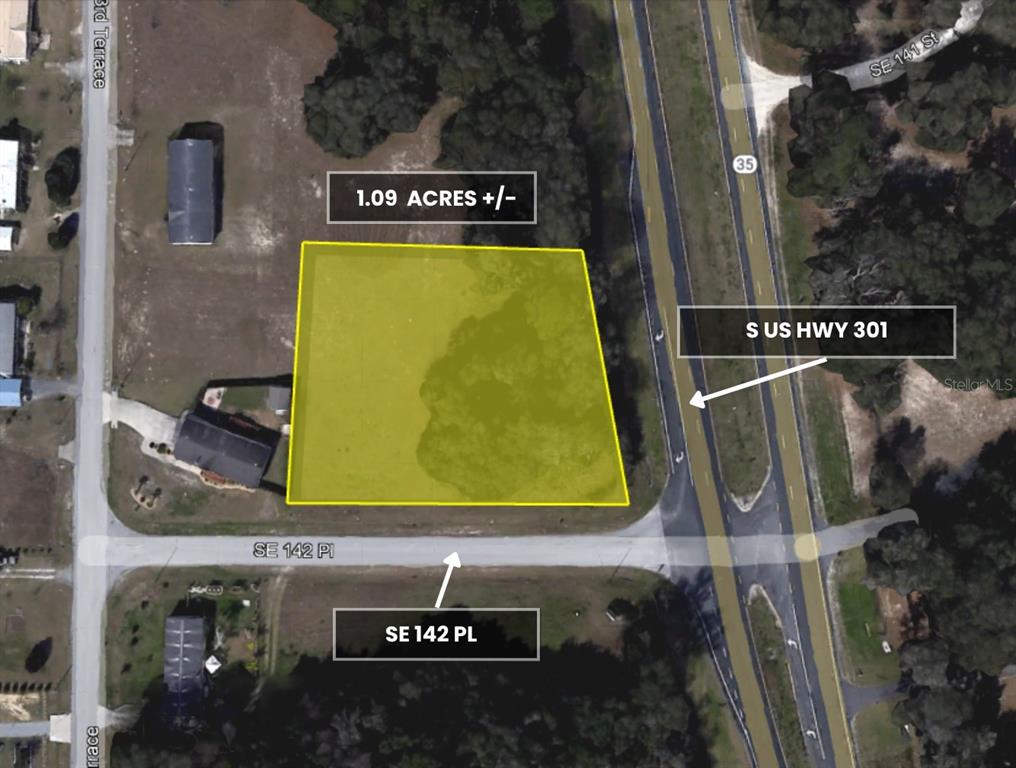 An aerial map shows a vacant rectangular lot with labeled dimensions bordering a highway — Corner SE 142ND PLACE & S US HWY-301, SUMMERFIELD, FL