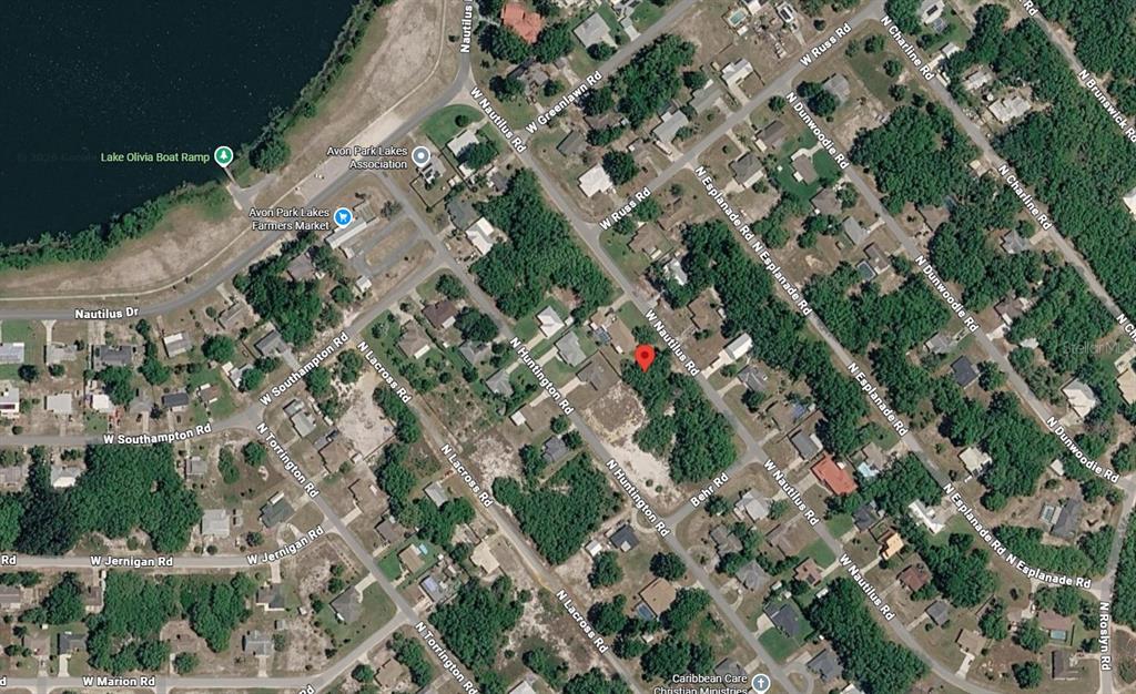 This is an aerial map view of a residential neighborhood with streets and a lake — 2479 W NAUTILUS ROAD, AVON PARK, FL