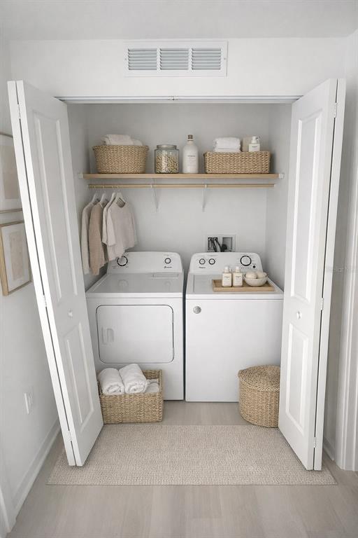 A laundry closet features a white washer and dryer, a wooden shelf, and woven baskets — 5587 MILLENIA BOULEVARD UNIT 207, ORLANDO, FL