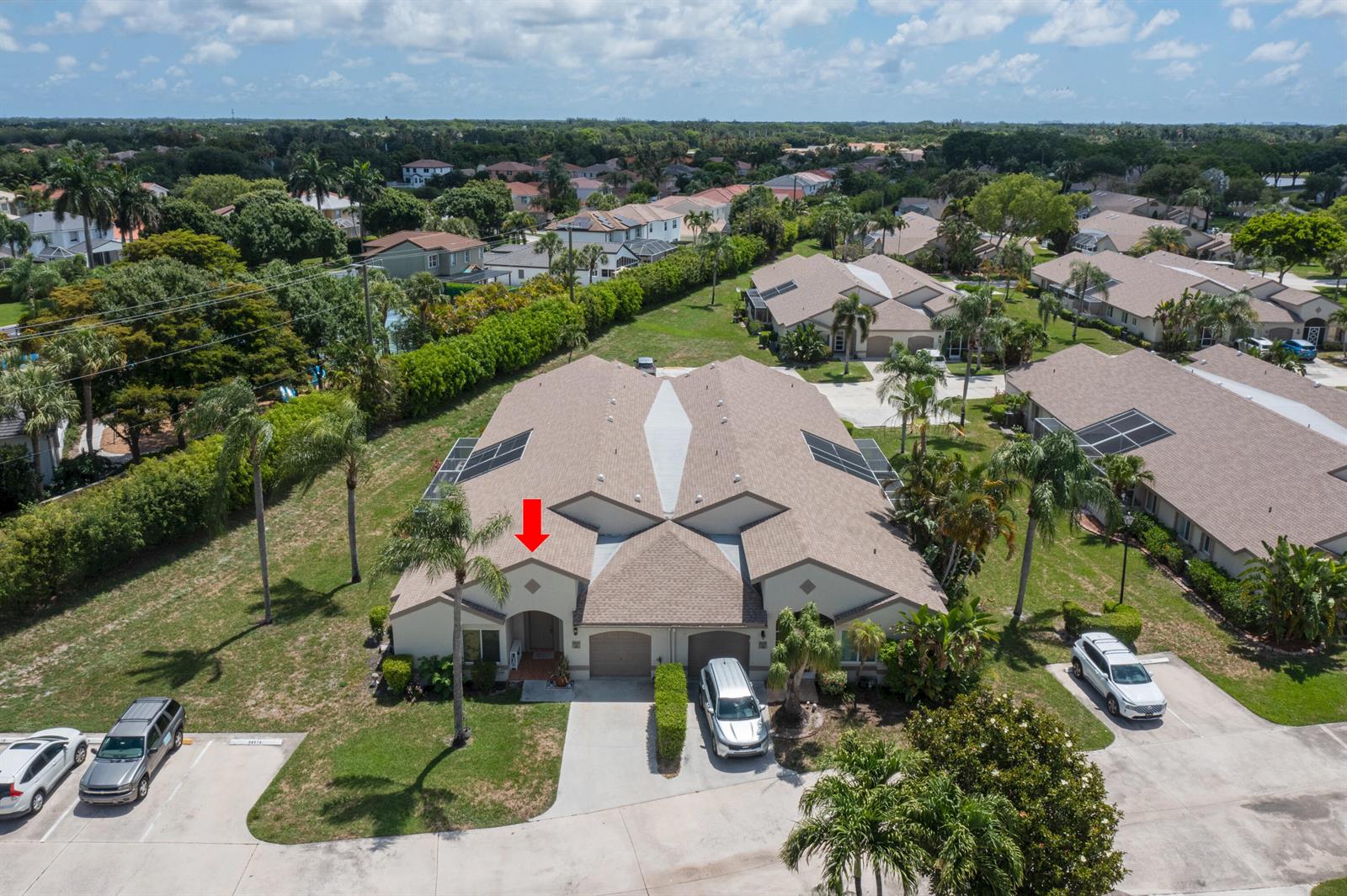 An aerial view shows a residential duplex with a red arrow pointing to the entrance — 9497 Boca Gardens Parkway # A, Boca Raton FL 33496, BOCA RATON, FL