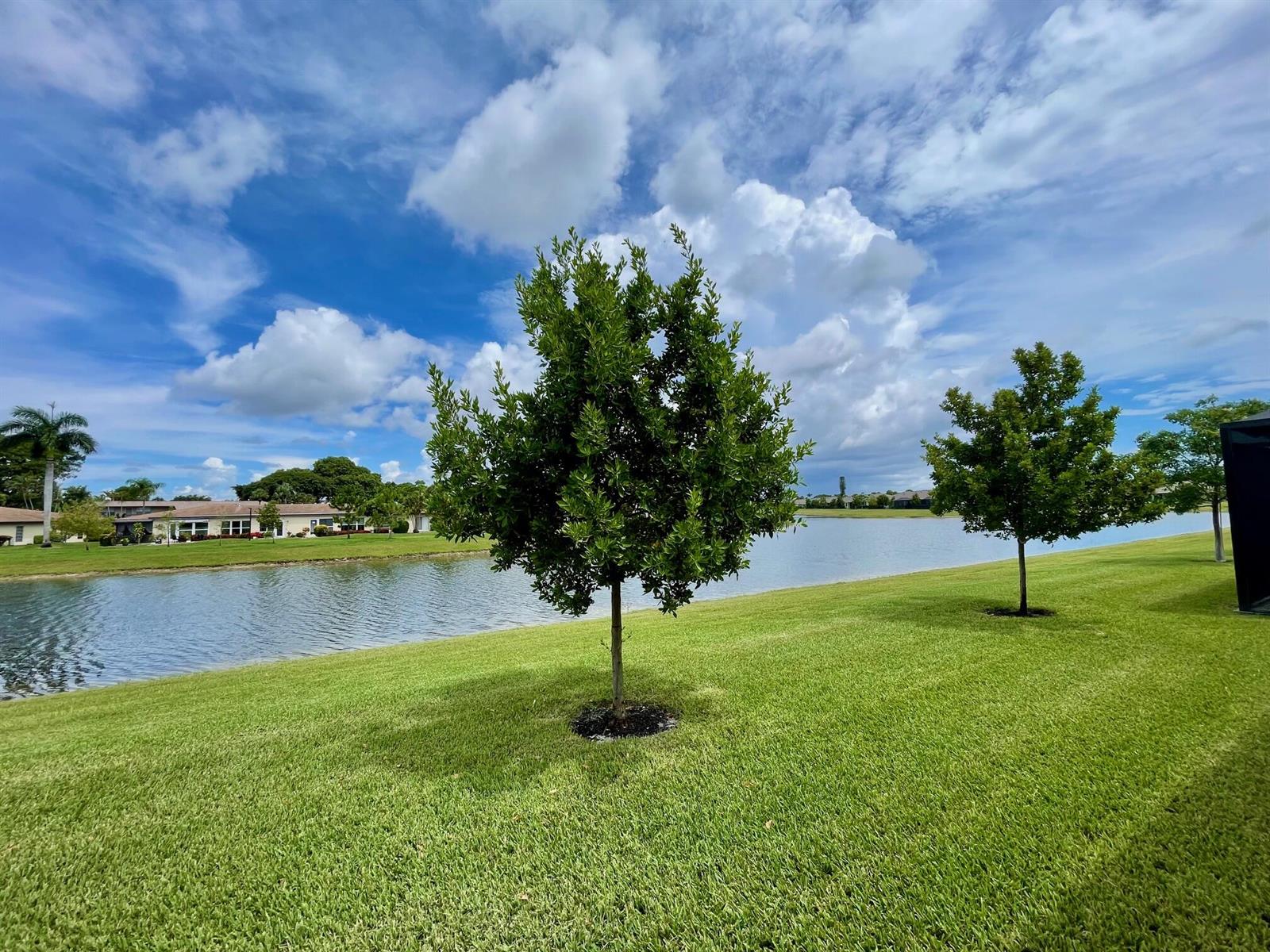 A single-story house with a paver driveway, a two-car garage, and a landscaped front yard — 13809 Hero Path, Delray Beach FL 33484, DELRAY BEACH, FL