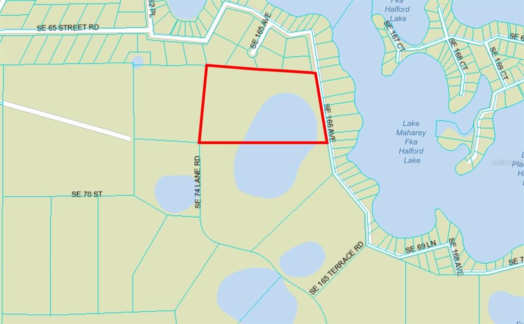 This is a map showing a parcel of land outlined in red near a lake — SE 74TH LANE ROAD UNIT 9-WEST, OCKLAWAHA, FL