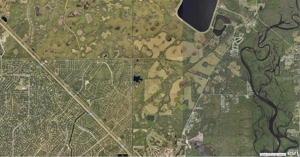 This is an aerial map view showing a mix of residential neighborhoods and undeveloped land — 1127226126 LARGELEAF STREET, NORTH PORT, FL