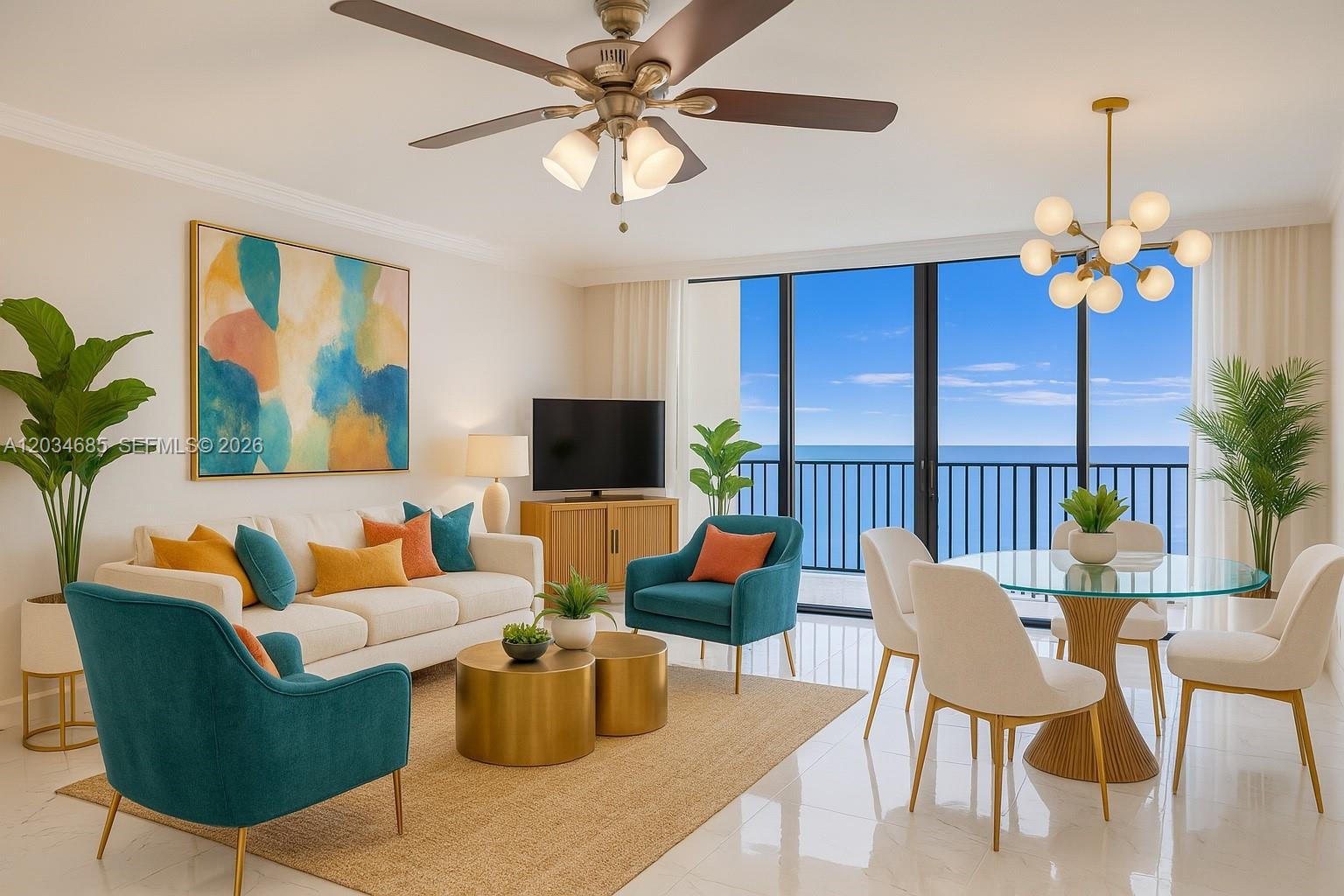 A bright living and dining area features modern furniture, gold accents, and ocean views — 2401 S Ocean Dr # 2402, Hollywood FL 33019, HOLLYWOOD, FL