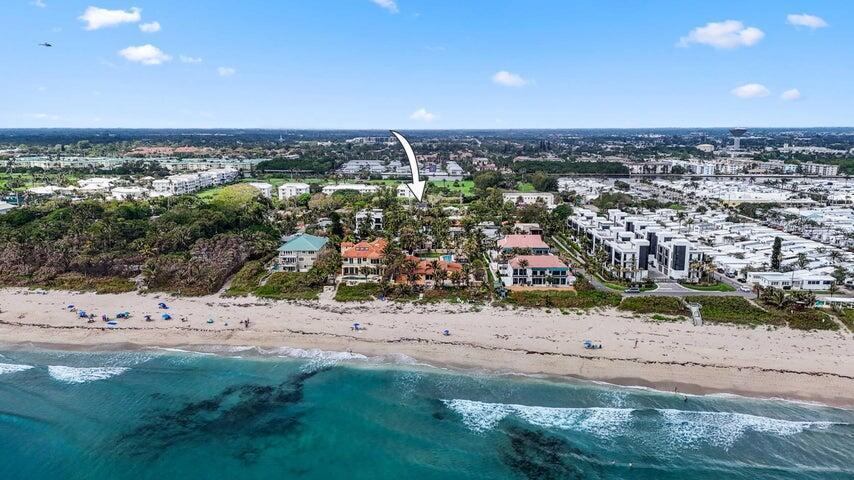 An aerial view shows a beachfront property with a white arrow pointing toward a house — 4603 N Ocean Boulevard, Boynton Beach FL 33435, BOYNTON BEACH, FL
