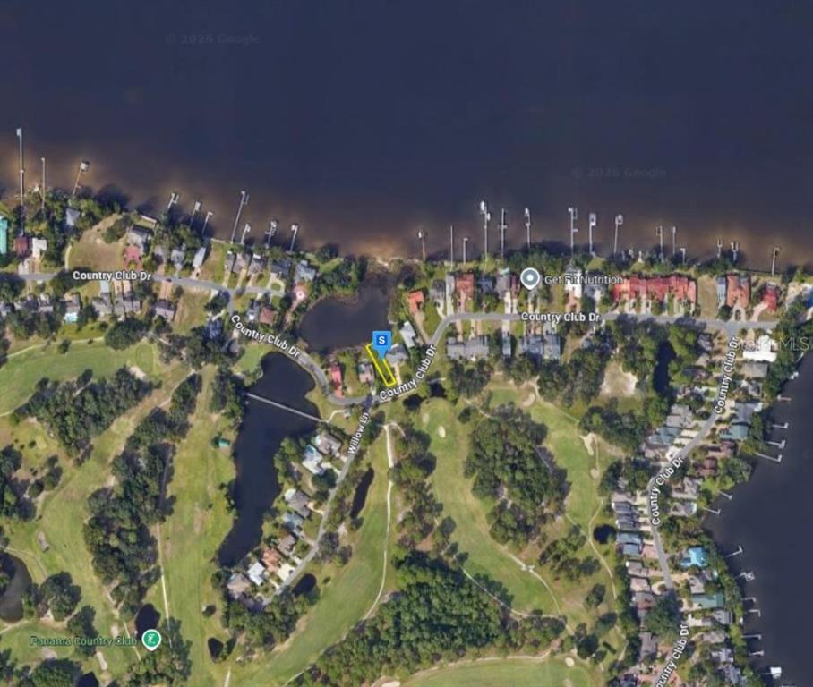 This is an aerial map view of a residential area along a waterfront — 1990 COUNTRY CLUB DRIVE, LYNN HAVEN, FL