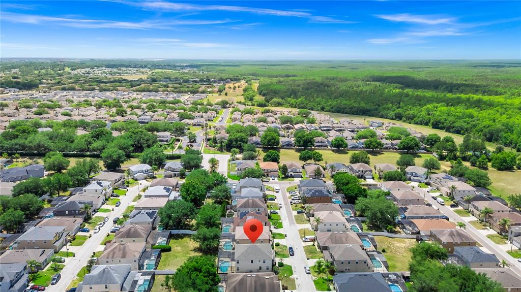 An aerial view shows a residential neighborhood with a red location pin on a house — 200 ANDOVER DRIVE, DAVENPORT, FL