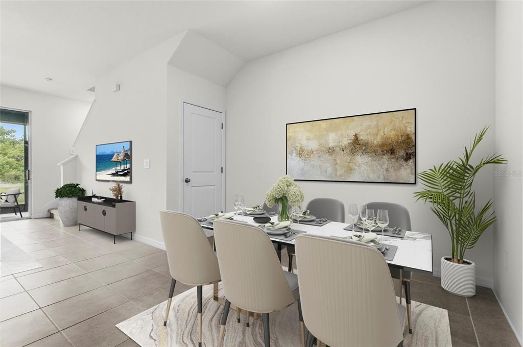 A dining room features a marble-topped table, six chairs, abstract wall art, and tile flooring — 8652 MILESTONE DRIVE, SARASOTA, FL