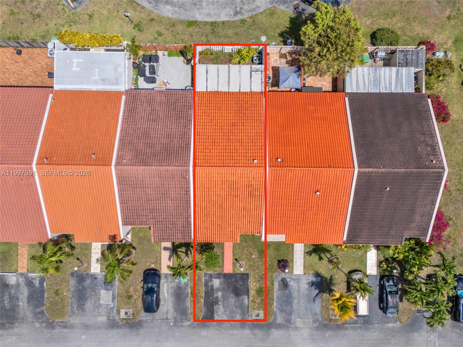 An aerial view shows a row of townhouses with a red-outlined unit in the center — 6323 SW 147th Place Cir, Miami FL 33193, MIAMI, FL