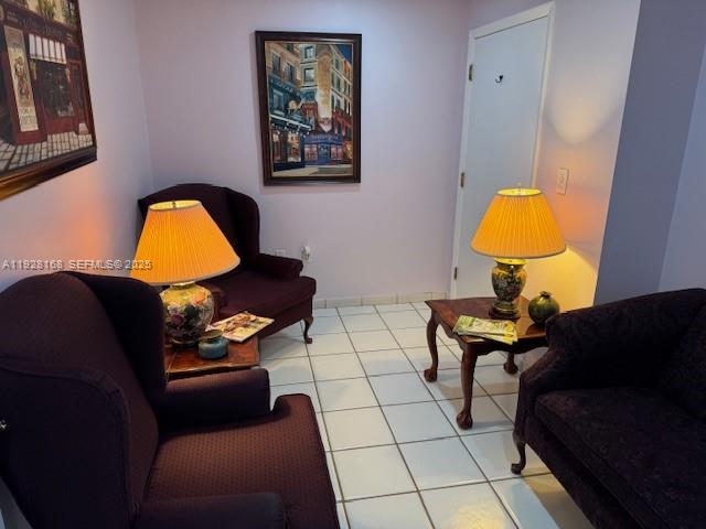 A sitting area features two dark armchairs, a small side table, and two lamps — 7325 SW 63rd Ave # B, South Miami FL 33143, SOUTH MIAMI, FL