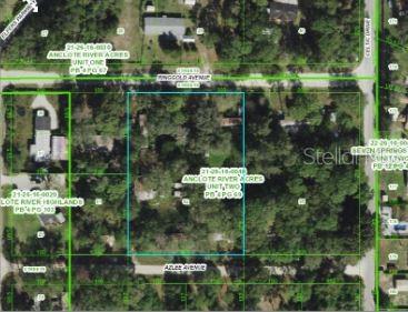This is a satellite map view showing a rectangular property parcel outlined in blue — 6927 AZLEE AVENUE, NEW PORT RICHEY, FL