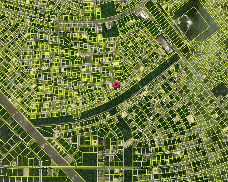 This is an aerial map showing a residential neighborhood with a highlighted property lot — 3884 SW 171ST LANE, OCALA, FL