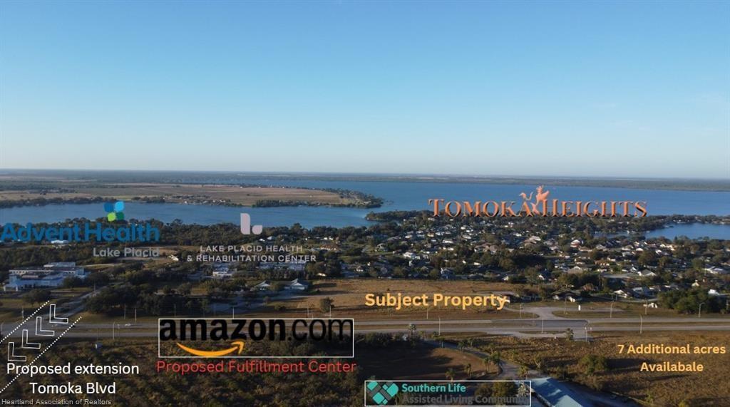 This aerial view shows a land parcel with labels for nearby developments and proposed projects — 1346 US 27, Lake Placid FL 33852, LAKE PLACID, FL