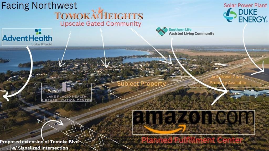 An aerial view shows a plot of land near a lake, residential areas, and infrastructure — 1346 US 27, Lake Placid FL 33852, LAKE PLACID, FL