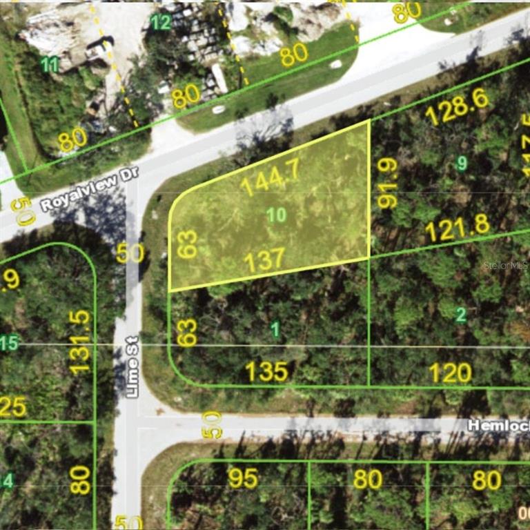 This is an aerial map showing a highlighted vacant residential lot at a street corner — 17098 HEMLOCK AVENUE, PORT CHARLOTTE, FL