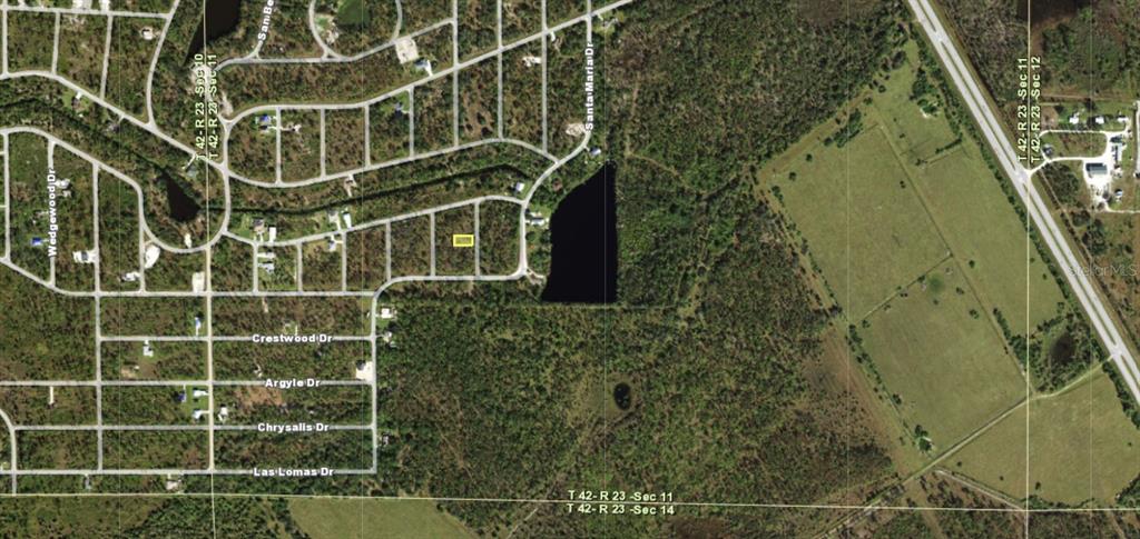 An aerial map shows a highlighted rectangular parcel of land near a lake and residential streets — 13347 CAPPY TERRACE, PUNTA GORDA, FL