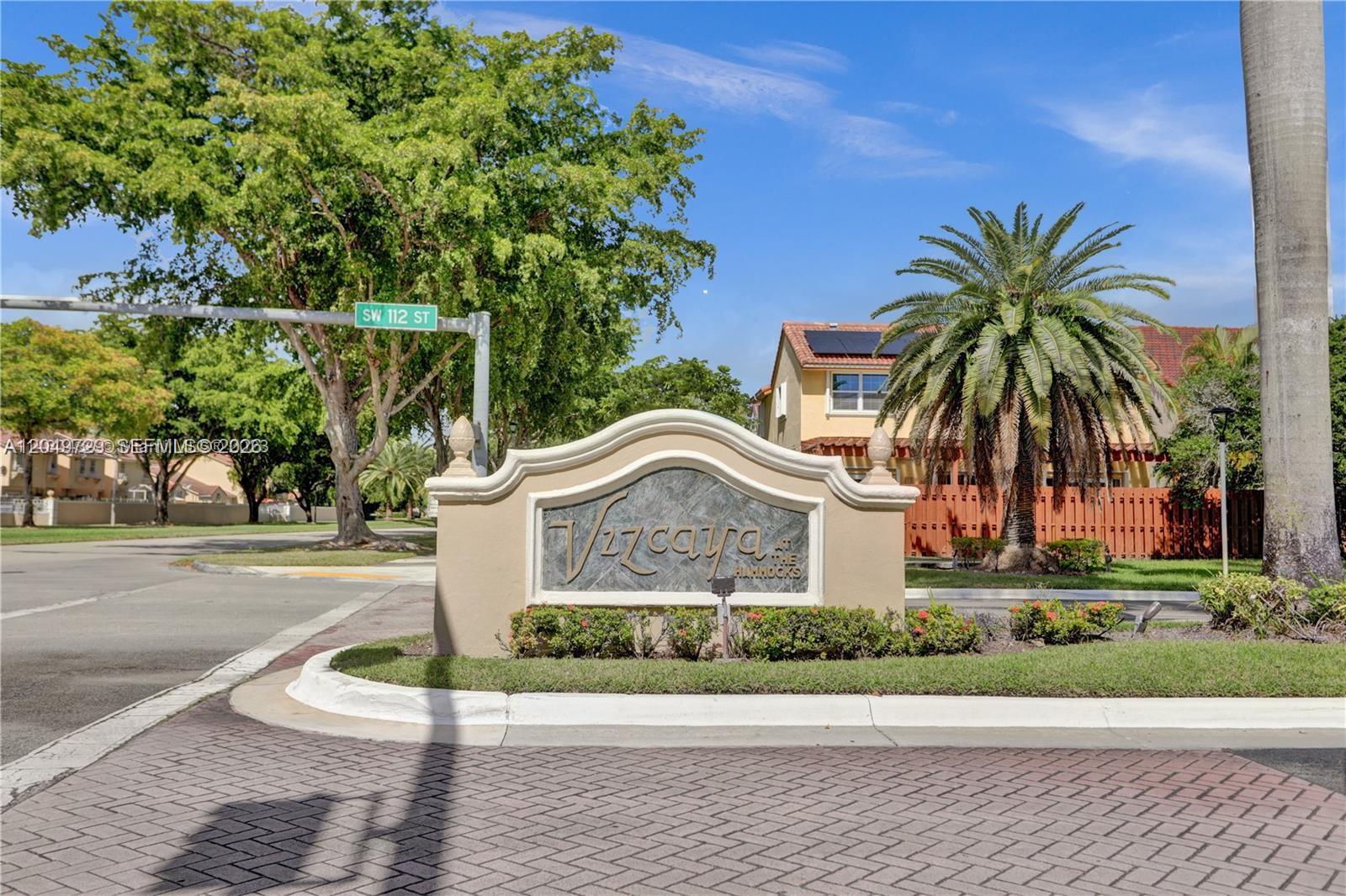 A stone monument sign for Vizcaya at the Hammocks stands at a street corner — 15184 SW 110th St, Miami FL 33196, MIAMI, FL