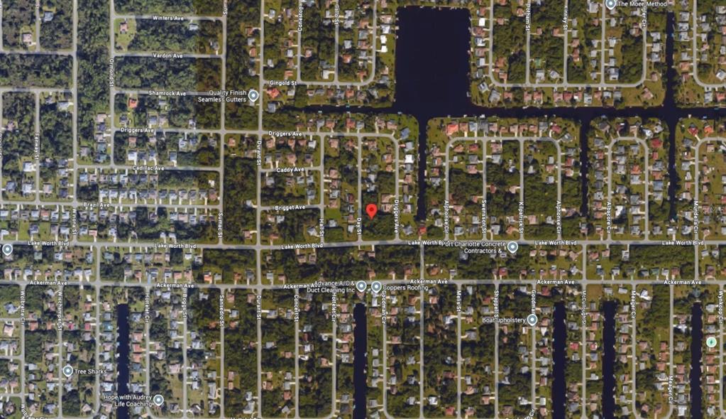 This is an aerial map view of a residential neighborhood with canals and streets — 4250 DAY STREET, PORT CHARLOTTE, FL