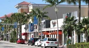 A street-level view of a commercial building with palm trees and parked cars — HARDING AVE HARDING KOSCHER RESTAURANT, Surfside FL 33154, SURFSIDE, FL