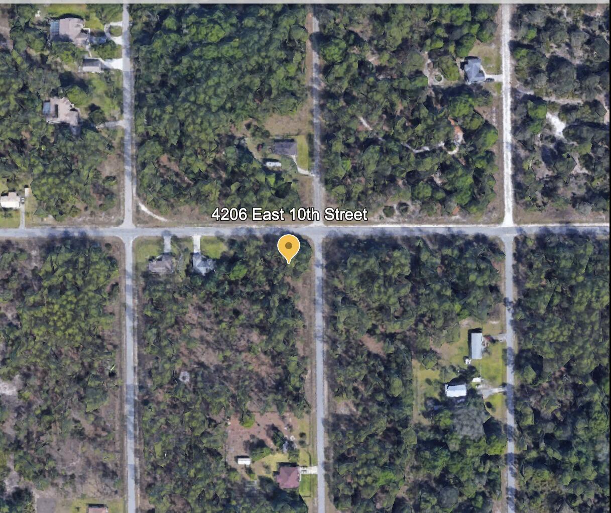 An aerial map view shows a corner lot surrounded by trees and residential streets — 4206 E 10th Street, FL 33972, FL