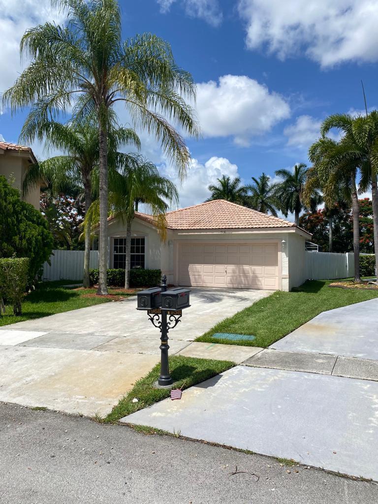 A stone monument sign for Sapphire Bay stands in front of trees and landscaping — 1968 SW 177th Avenue, Miramar FL 33029, MIRAMAR, FL