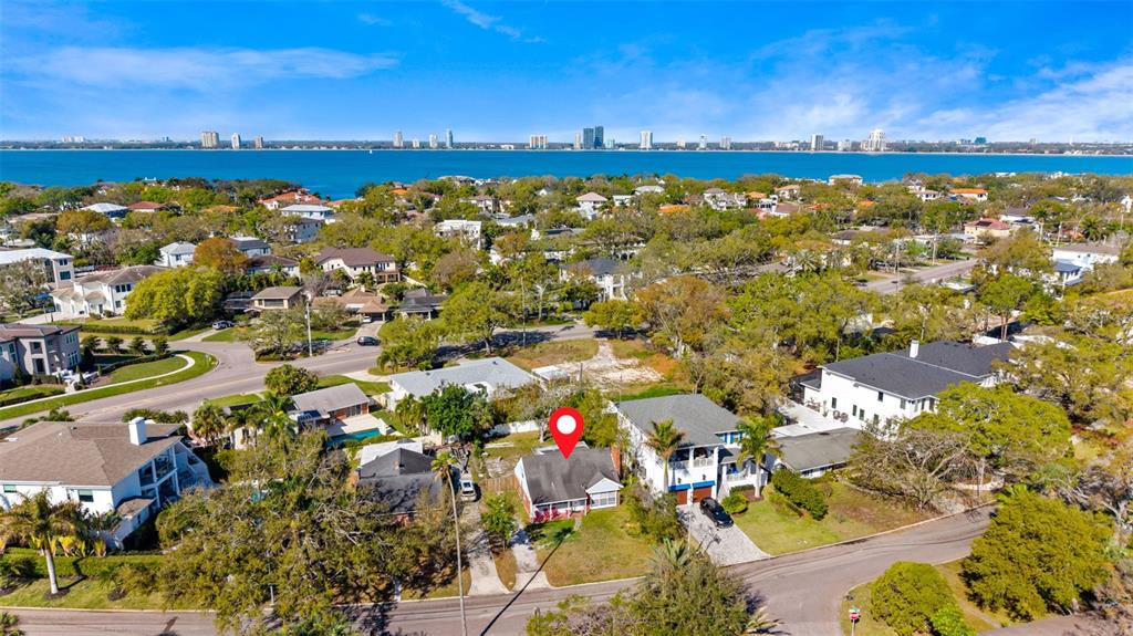 An aerial view shows a residential neighborhood with a red pin marking a single-story house — 544 SEVERN AVENUE, TAMPA, FL