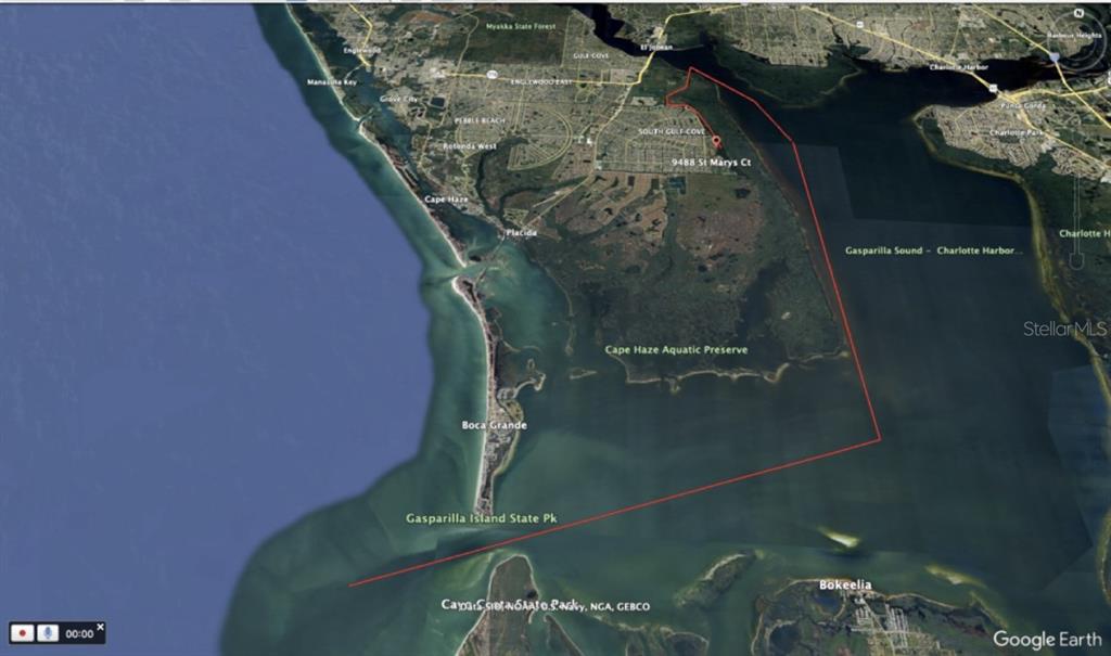 This is a satellite map showing a property location outlined in red near Charlotte Harbor — 9488 ST MARYS COURT, PORT CHARLOTTE, FL