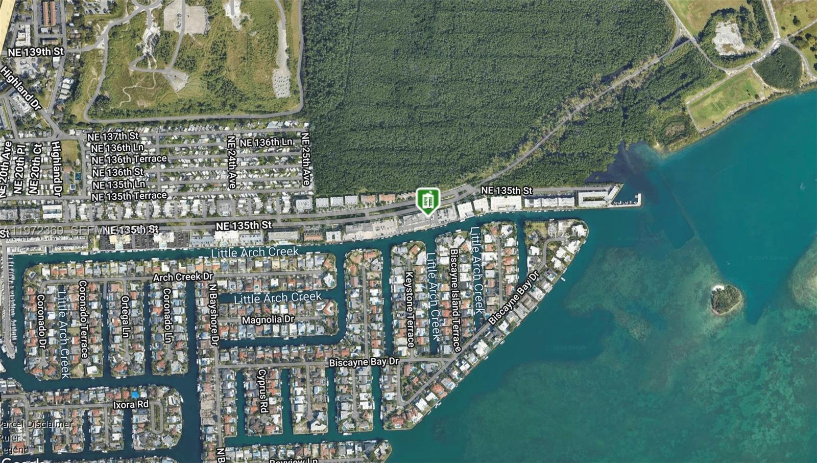 This is an aerial map view of a residential neighborhood near a waterway — 3500 NE 135 # 502, North Miami FL 33181, NORTH MIAMI, FL