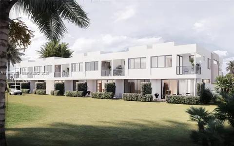 A rendering of a modern two-story white residential building with balconies overlooking a grassy lawn — 730 Cypress Grove Dr, Pompano Beach FL 33069, POMPANO BEACH, FL