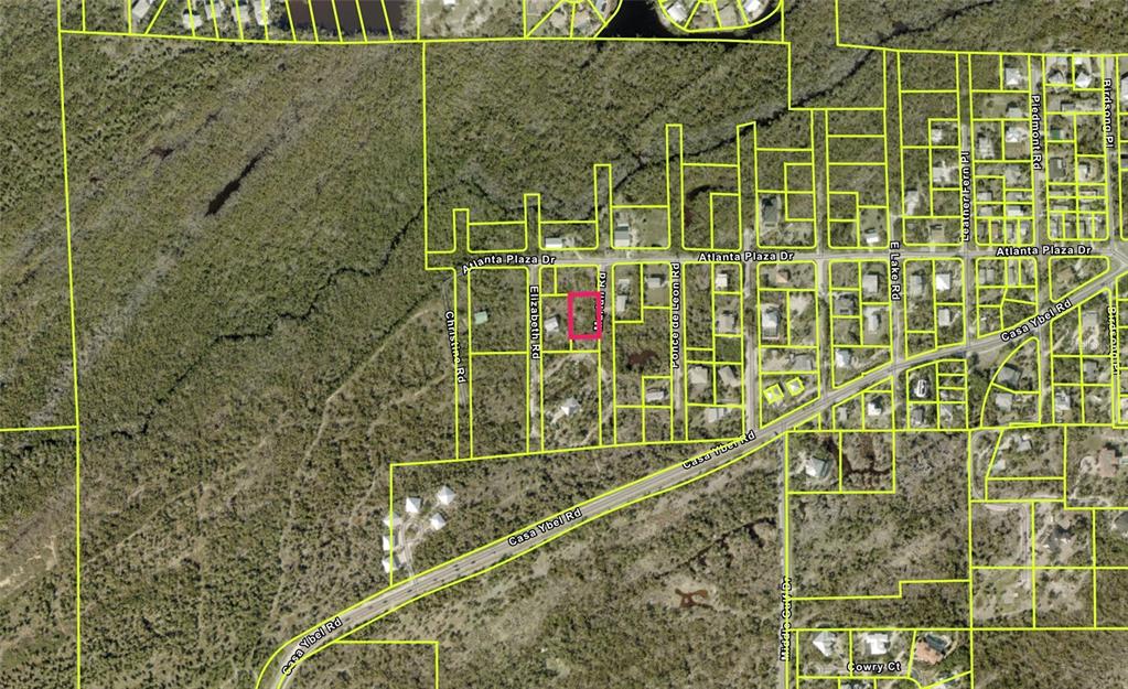 This is an aerial map showing a highlighted residential lot in a wooded neighborhood — 491 MARIAN ROAD, SANIBEL, FL