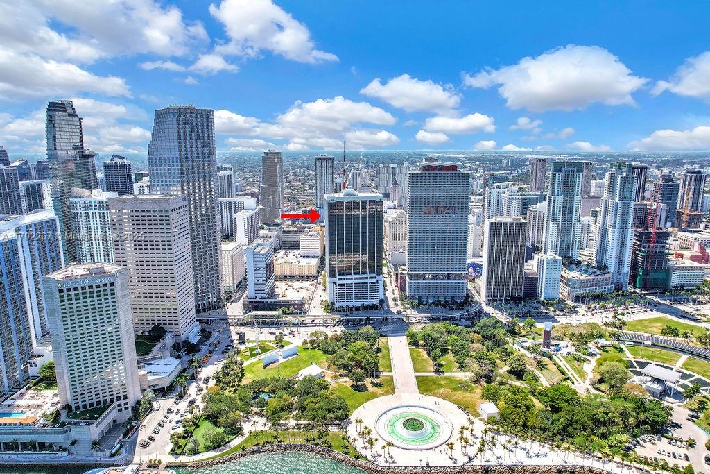 An aerial view of the Miami skyline featuring high-rise buildings and a waterfront park — 1 SE 3rd Ave, Miami FL 33131, MIAMI, FL