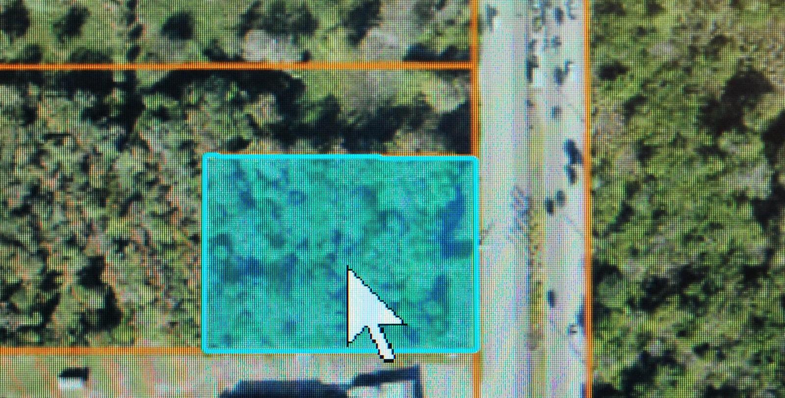 This is a digital map view showing a highlighted rectangular property parcel — 0000 S Us-1, Fort Pierce FL 34982, FORT PIERCE, FL
