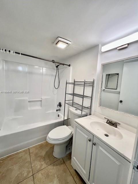 A bathroom features a white vanity, a toilet, and a shower-tub combination with tile flooring — 3690 N 56th Ave # 902, Hollywood FL 33021, HOLLYWOOD, FL