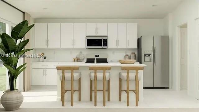 This is a rendering of a modern kitchen featuring white cabinetry, stainless steel appliances, and island seating — 2782 Pioneer Trail, Winter Haven FL 33839, WINTER HAVEN, FL