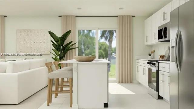 This is a rendering of a modern kitchen and living area with white cabinetry and island — 2782 Pioneer Trail, Winter Haven FL 33839, WINTER HAVEN, FL